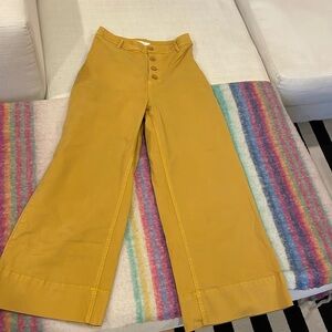 Yellow bell bottom pants size small